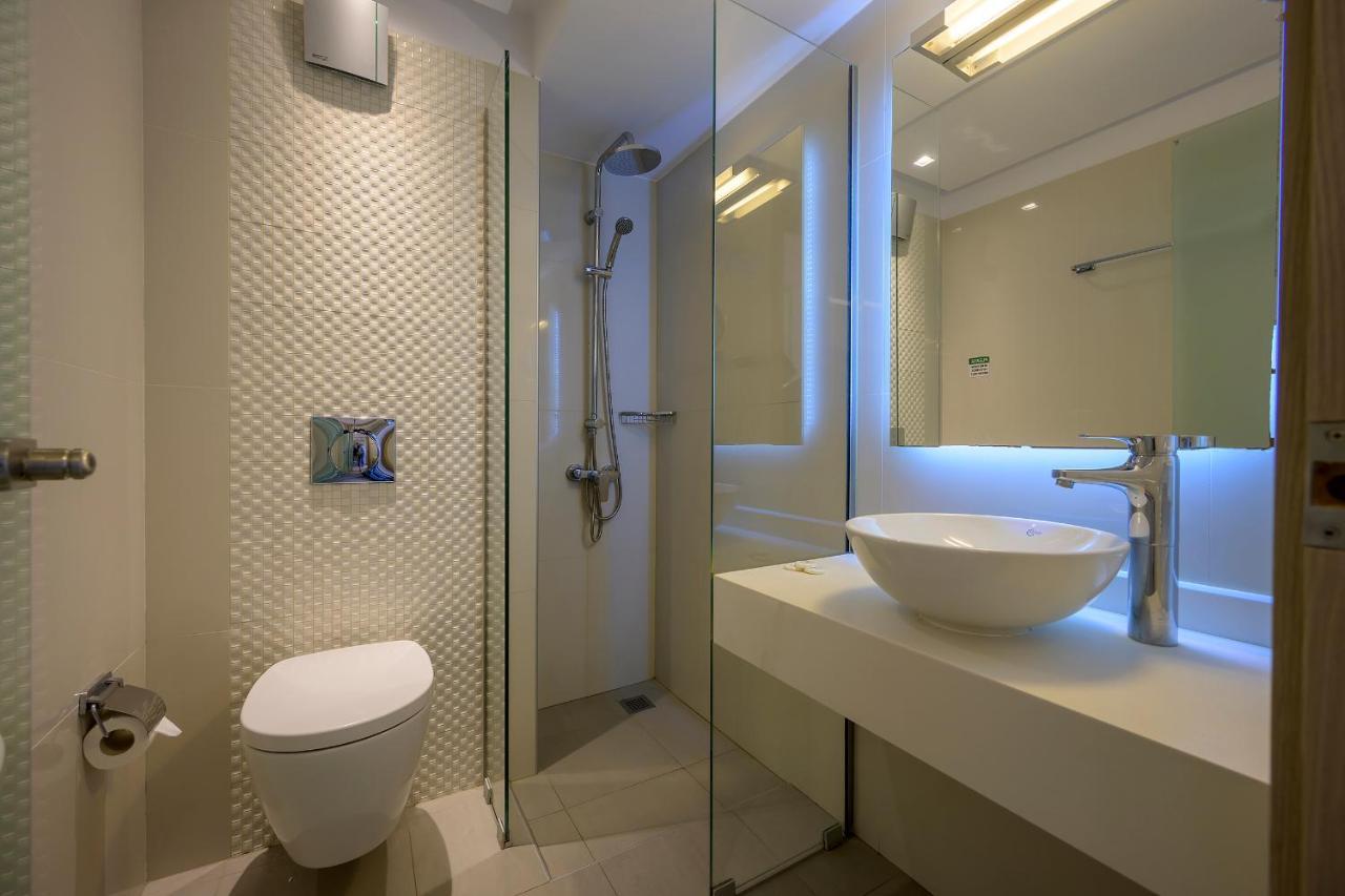 Mythos Suites Hotel ตีกากี ภายนอก รูปภาพ