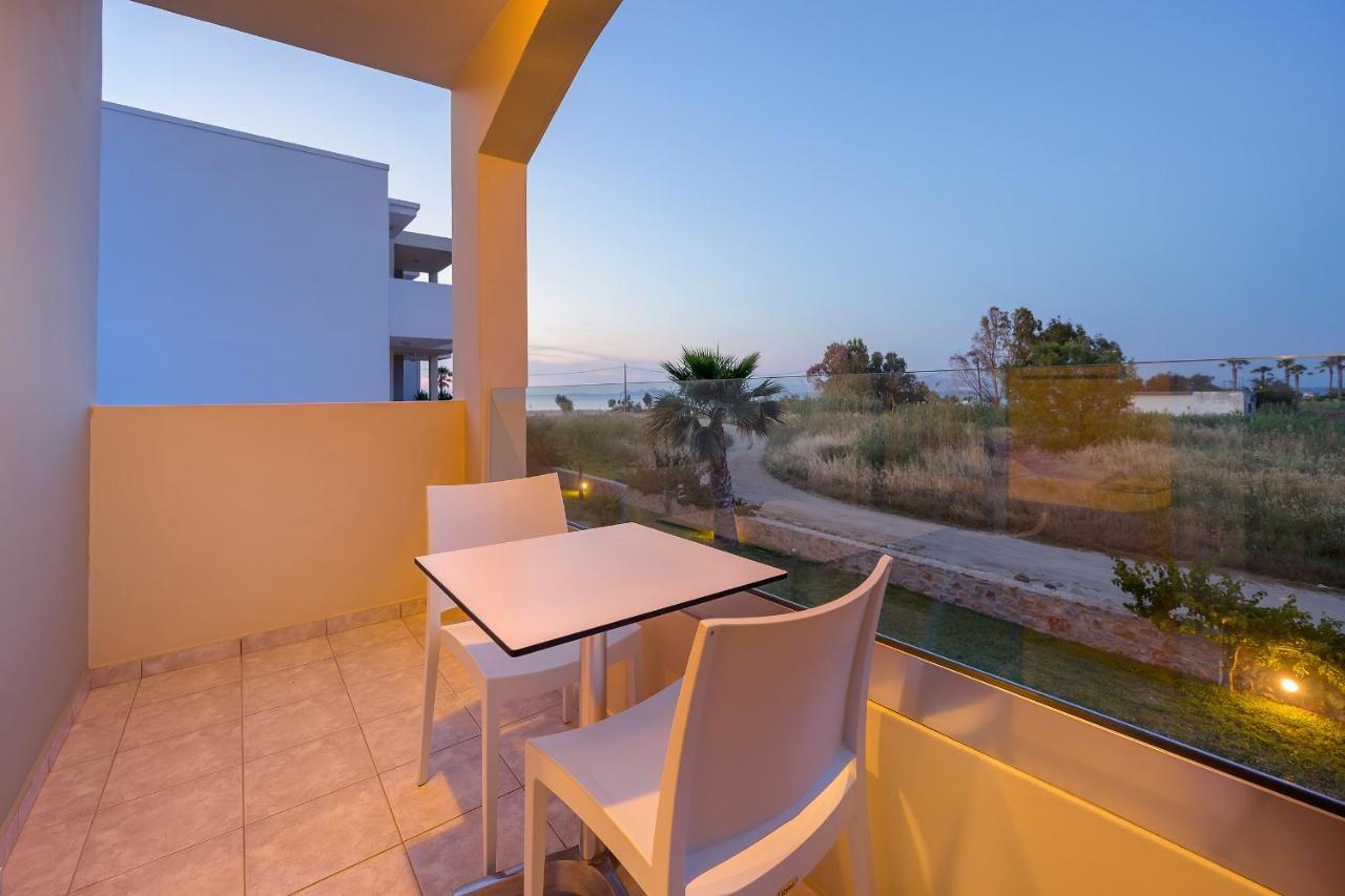 Mythos Suites Hotel ตีกากี ภายนอก รูปภาพ