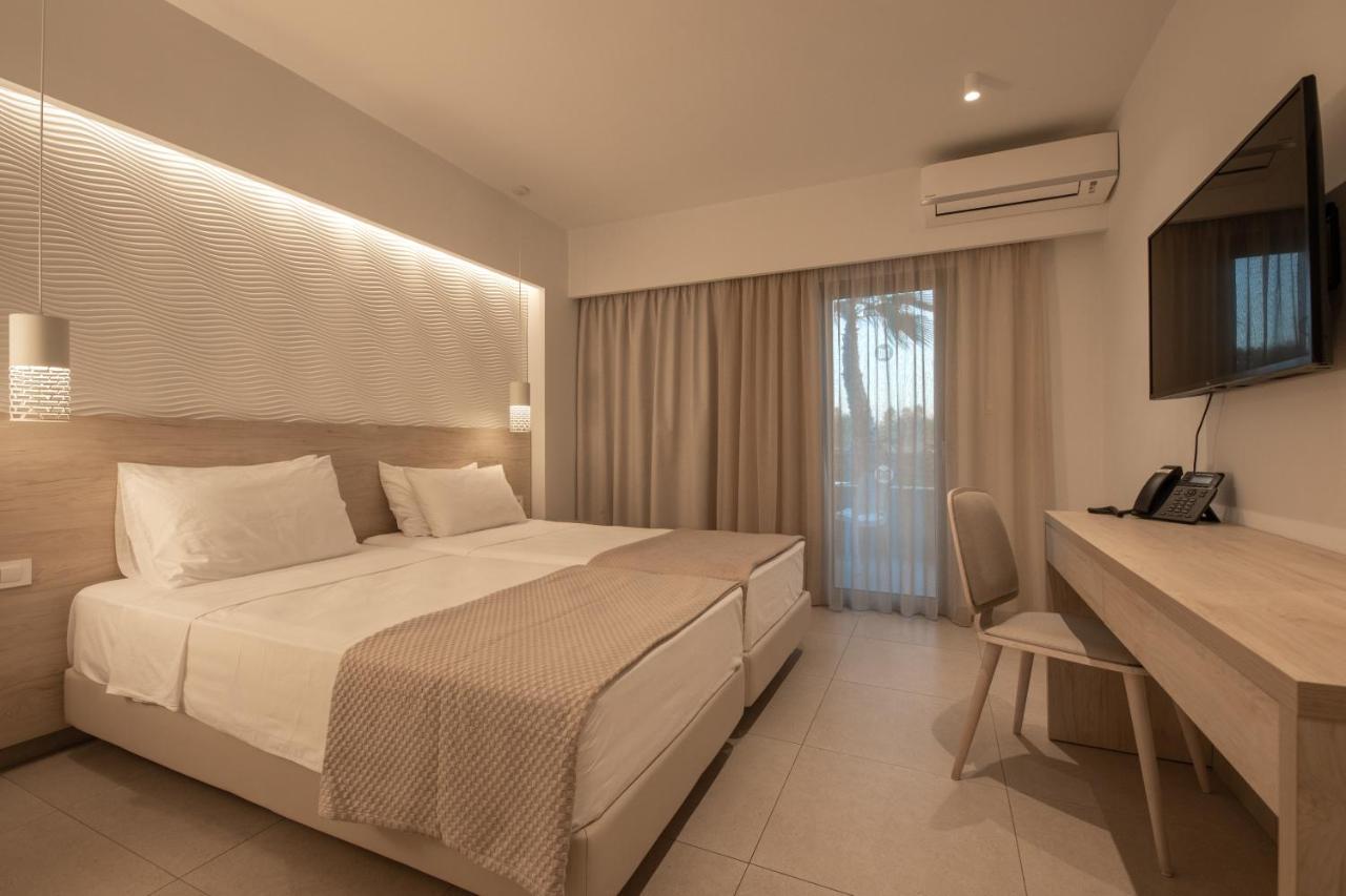 Mythos Suites Hotel ตีกากี ภายนอก รูปภาพ