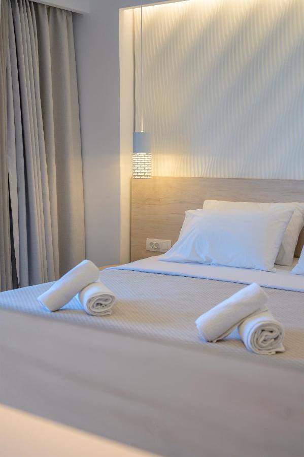Mythos Suites Hotel ตีกากี ภายนอก รูปภาพ