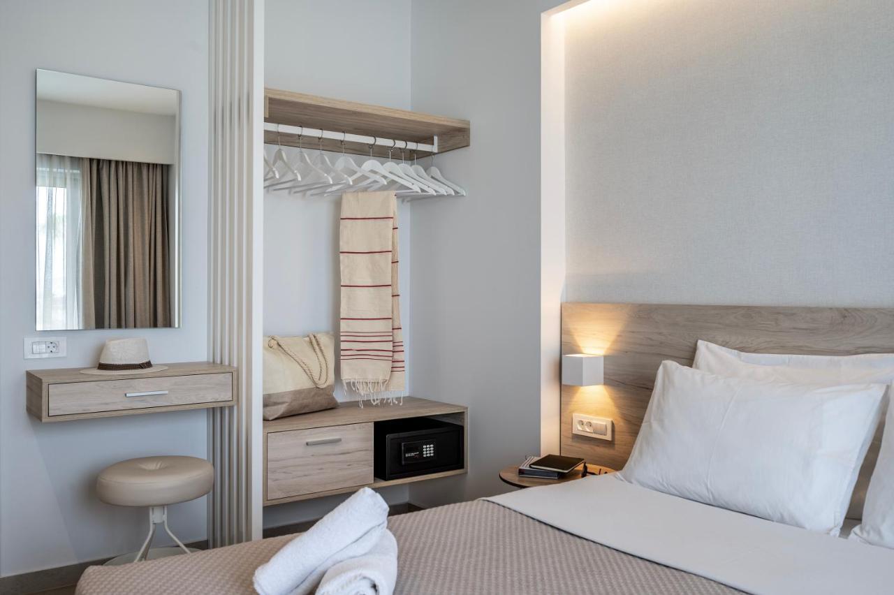 Mythos Suites Hotel ตีกากี ภายนอก รูปภาพ