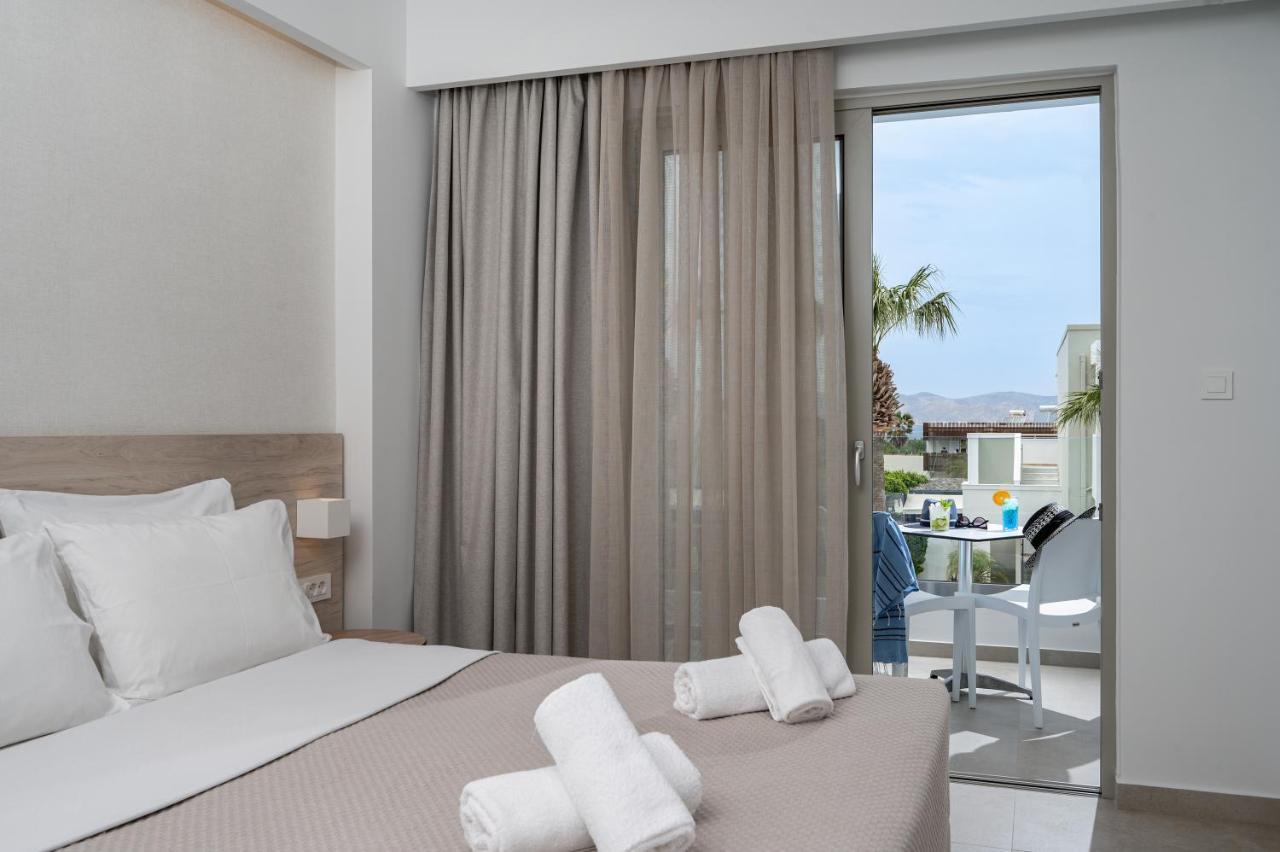 Mythos Suites Hotel ตีกากี ภายนอก รูปภาพ