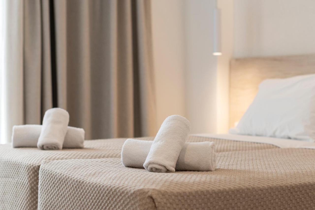 Mythos Suites Hotel ตีกากี ภายนอก รูปภาพ