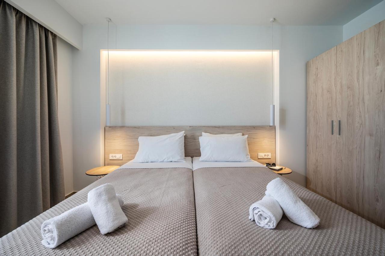 Mythos Suites Hotel ตีกากี ภายนอก รูปภาพ
