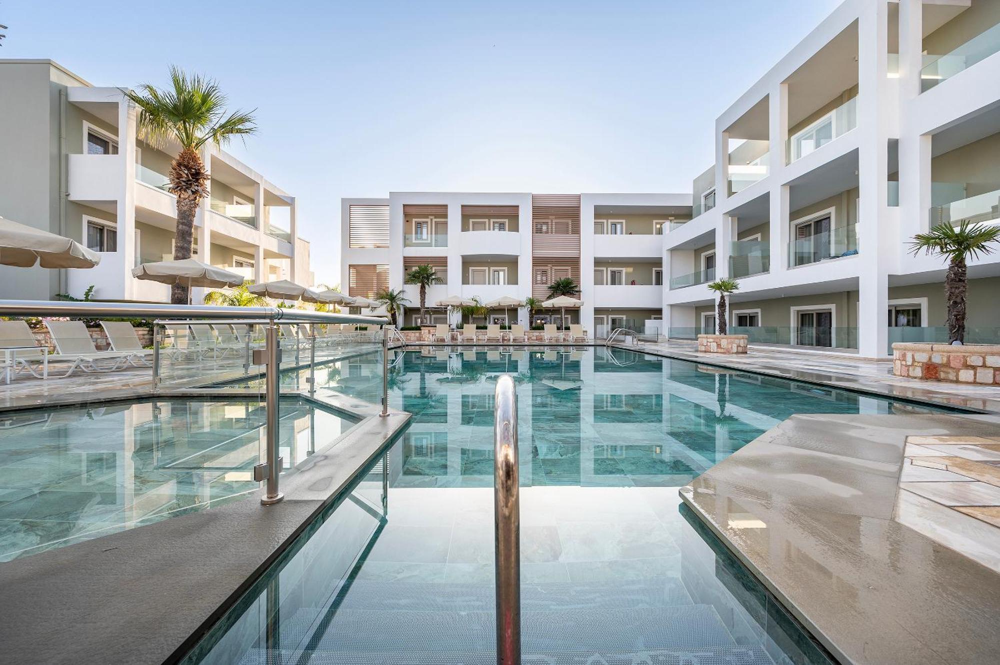 Mythos Suites Hotel ตีกากี ภายนอก รูปภาพ