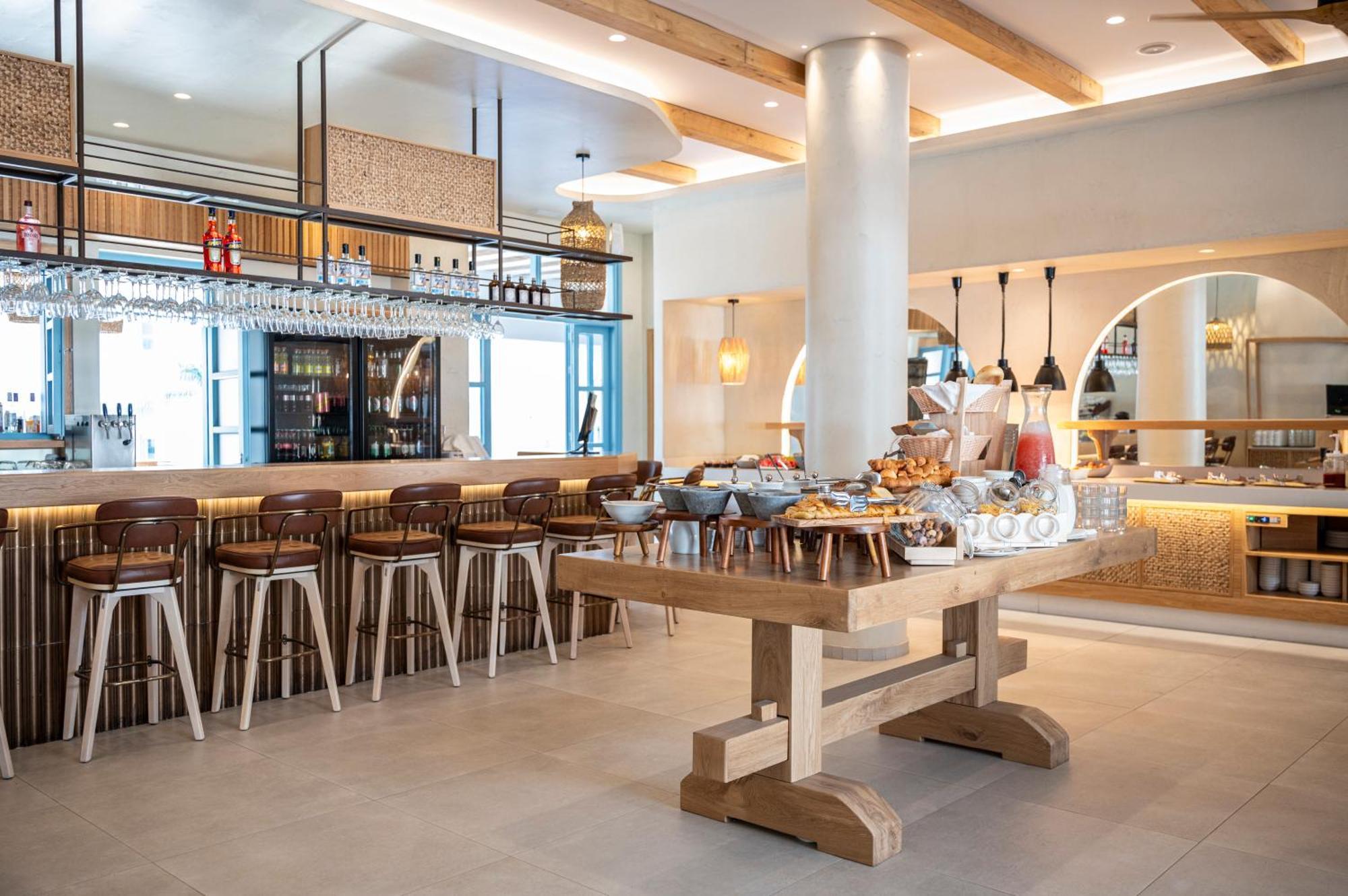 Mythos Suites Hotel ตีกากี ภายนอก รูปภาพ